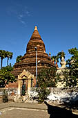 Bagan Myanmar. Next to the Gubyaukgyi stands the gilded Myazedi or 'Emerald Stupa'. 